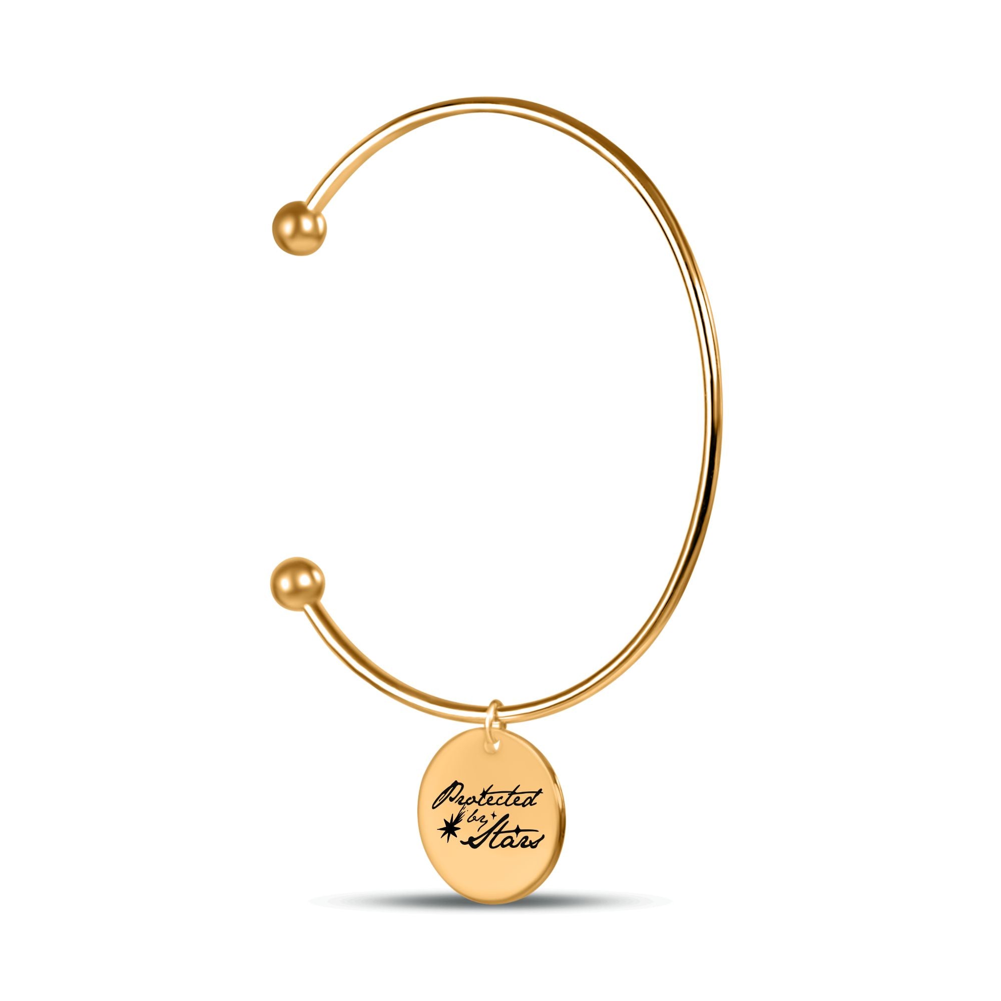 gold bracelet with celestial engraved talisman charm