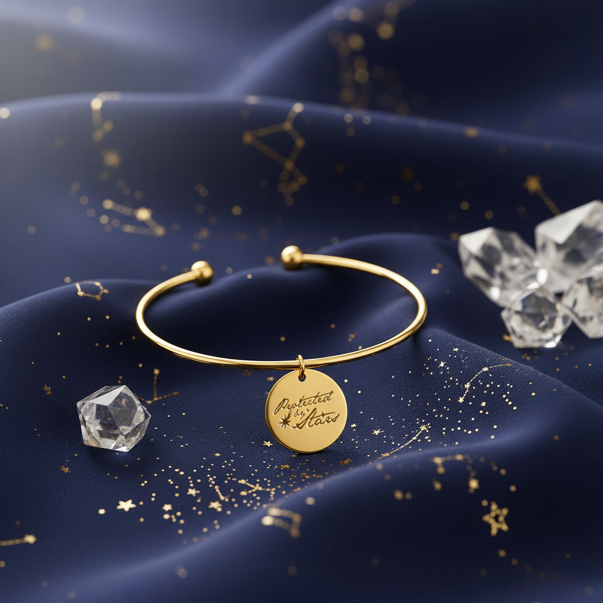 gold bracelet with celestial engraved talisman charm