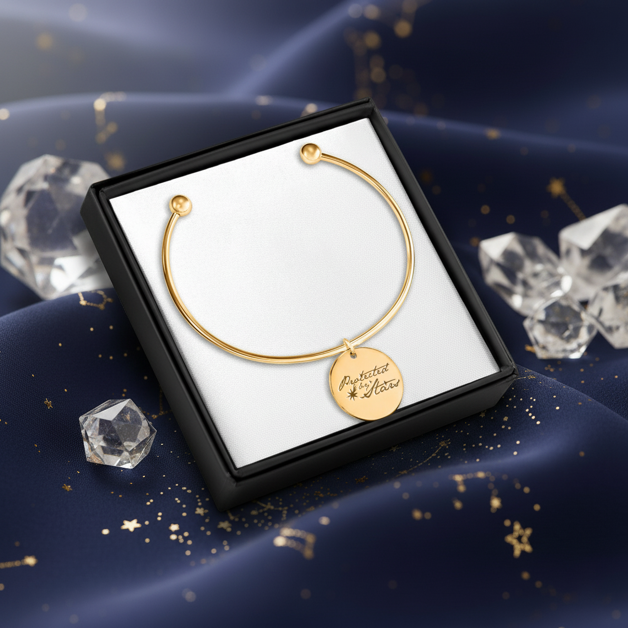 gold bracelet with celestial engraved talisman charm