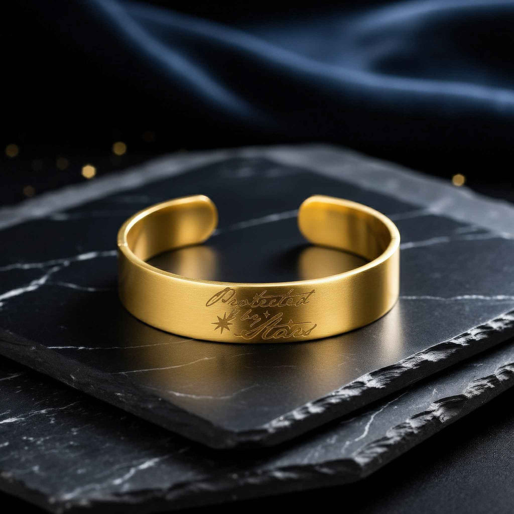 Gold Cuff Bracelet Engraved with "Protected by Stars" – Your Mindful Talisman